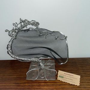 Jewelry hanger made from recycled aluminum by sustainable artist Jay Schiavone.